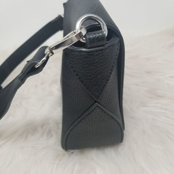 The Purse with a "C" tag inside. - Picture 9 of 10